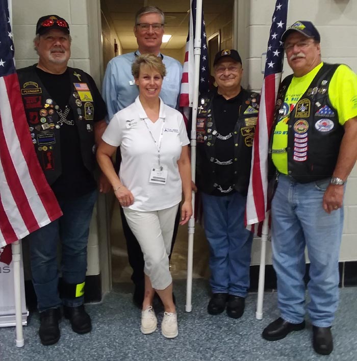 Caliber Loan Consultant Lee Bolton and Branch Manager Gary Huegel with Delaware Patriot Guard Riders John Peterson, Chuck Ewing and Dave Goodwin